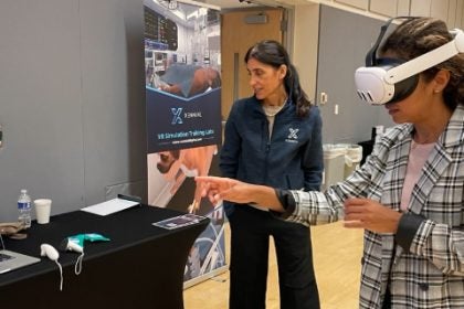 student wearing VR headset
